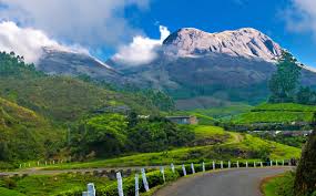 3 Days / 2 Nights: Madurai – Munnar – Thekkady – Madurai luxury sedan.